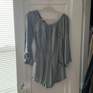 Cute boho teal romper with dramatic sleeve